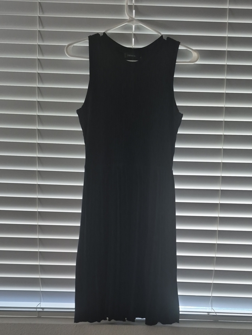 Sleeveless Black Dress with Ribbed Bodice